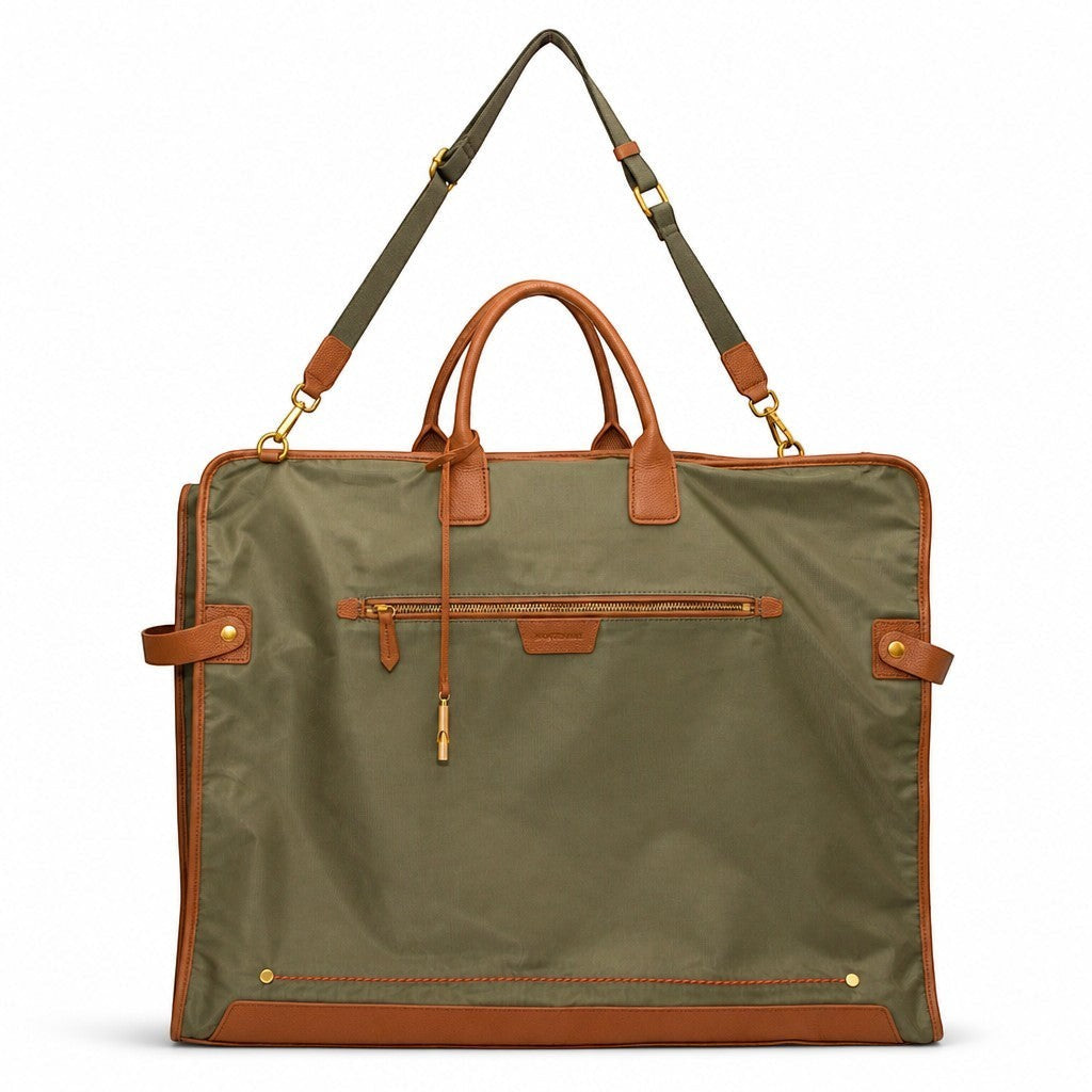 Montemaré Oslo olive green waterproof nylon garment bag with brown leather trim, top handles, and shoulder strap.