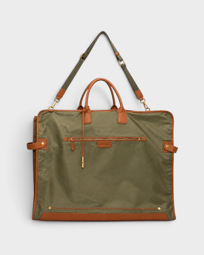 Montemaré Oslo premium olive green waterproof nylon garment bag with tan leather trim and adjustable shoulder strap.