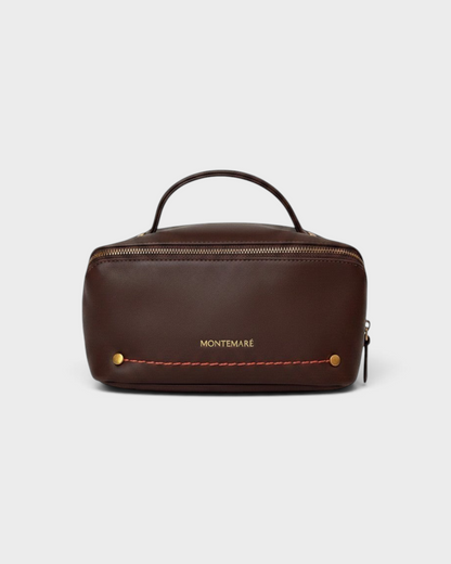Montemaré Roma foldout toiletry case in brown vegan leather with orange stitching and top handle