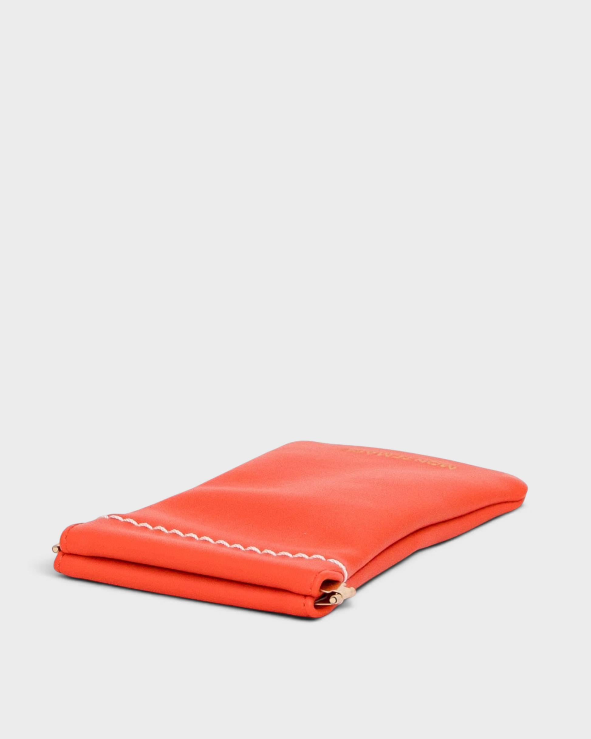 Montemaré Roma glasses case in vibrant orange vegan leather with a convenient spring-frame closure.