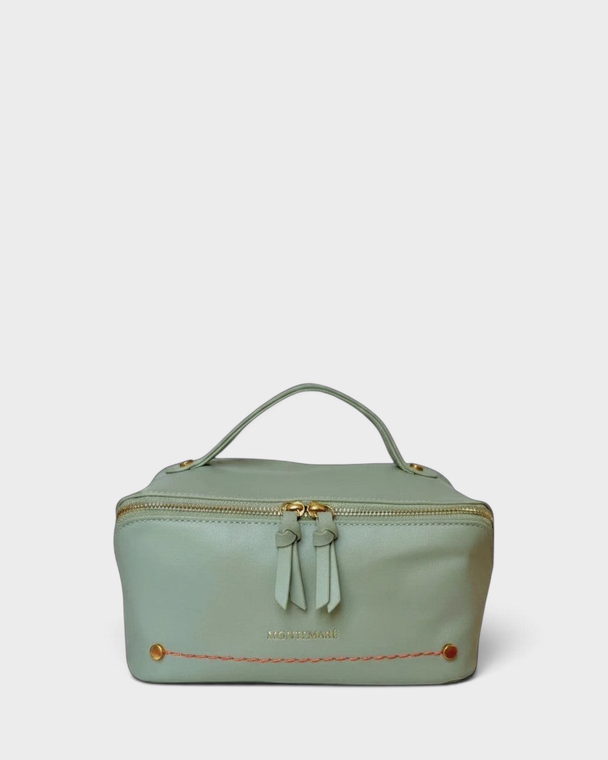 Montemaré Roma foldout toiletry case in sage green vegan leather with gold zippers and orange accent stitching.