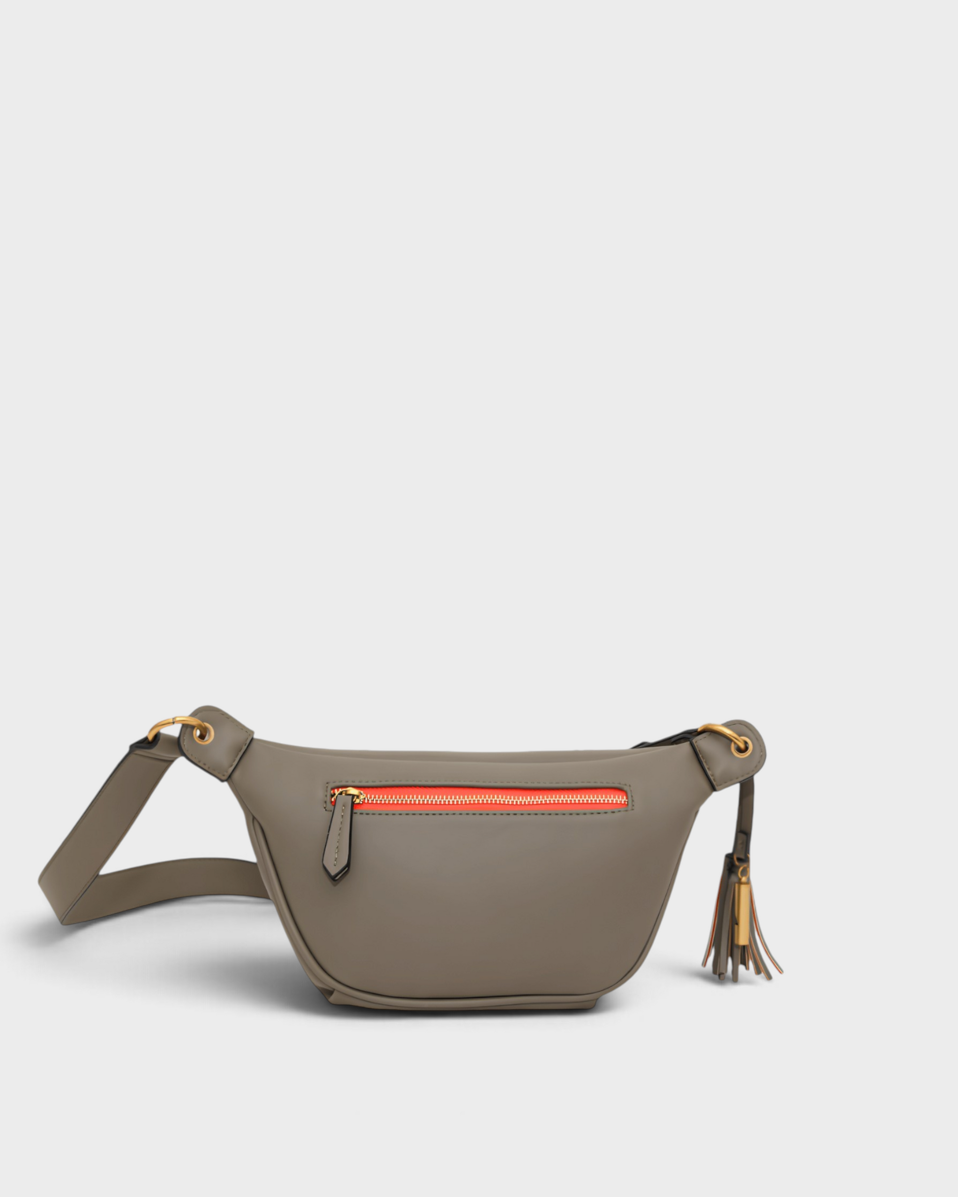 Montemaré Roma Sling bag in grey vegan leather with a vibrant orange zipper detail and signature safety whistle tassel.