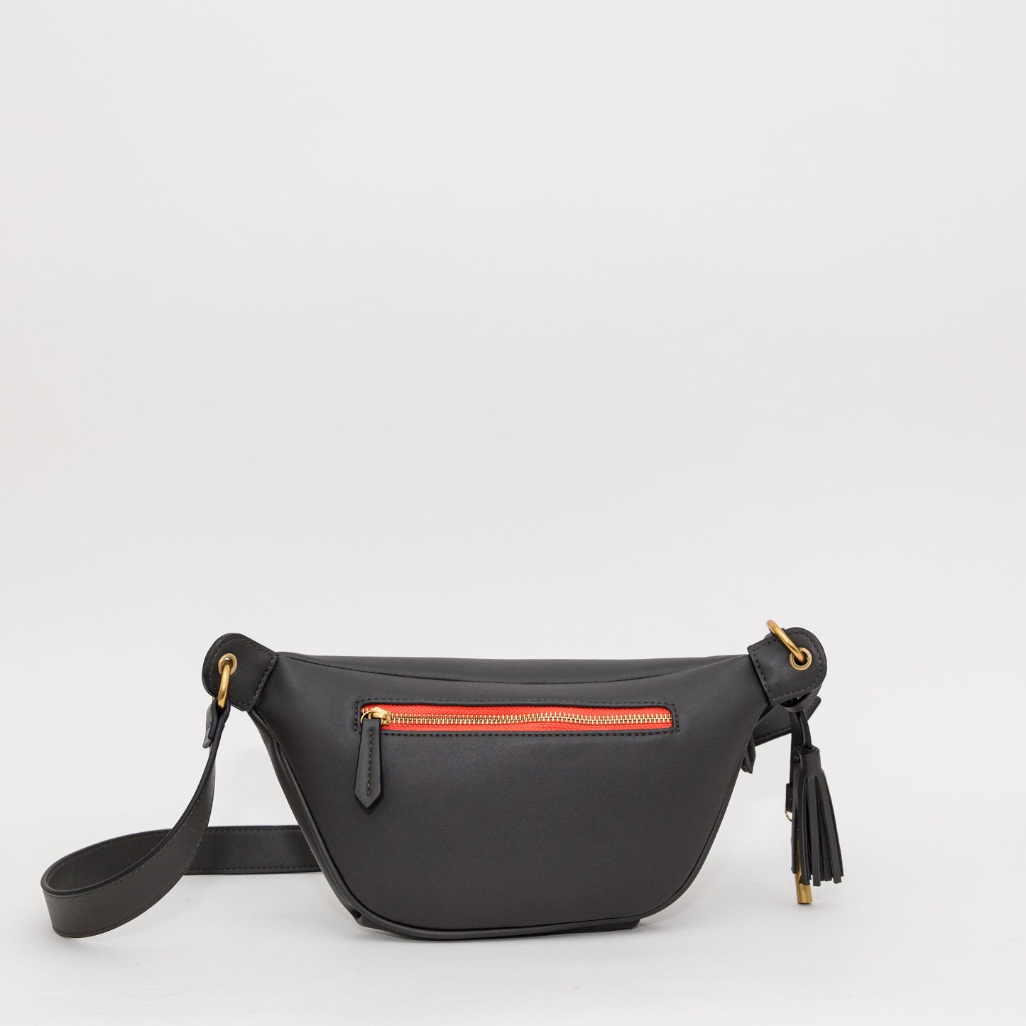 Slate sling with an orange and brass-finished zipper on a white background.