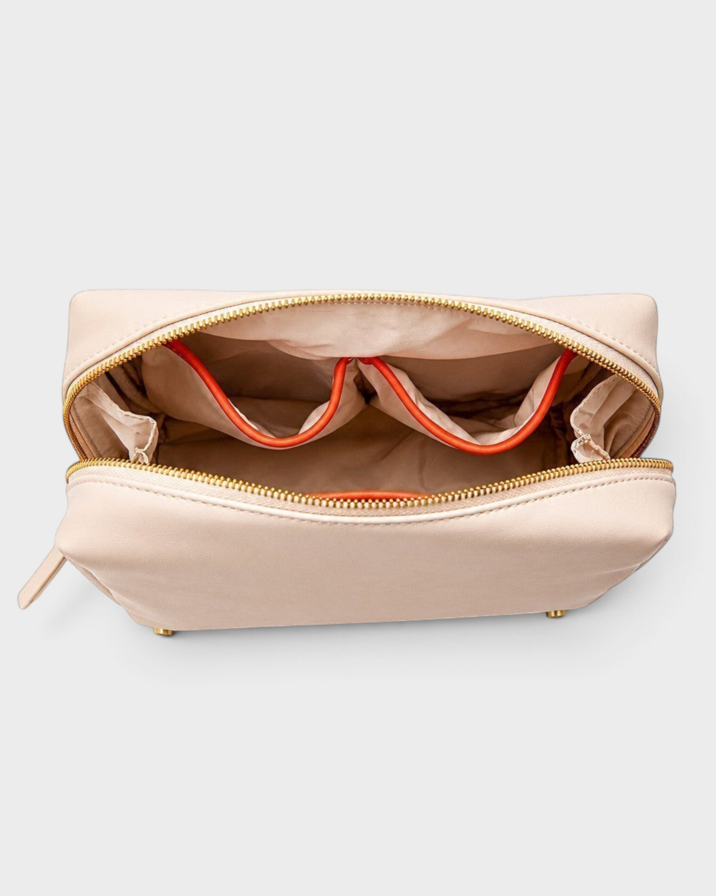 Montemaré Roma standing toiletry case in beige vegan leather with orange interior pocket trim and gold zipper