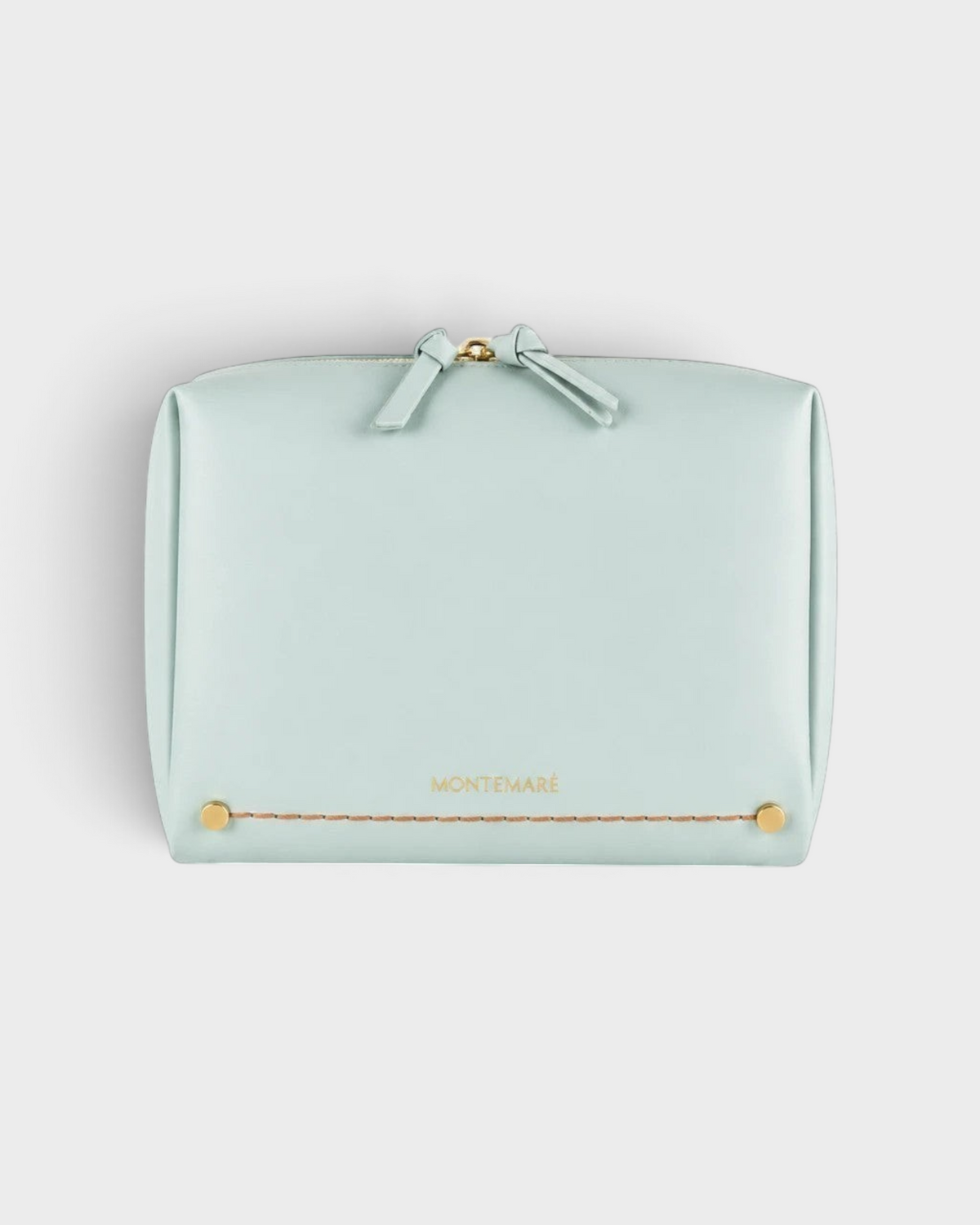 Montemaré Roma standing toiletry case in light blue vegan leather with gold hardware and a wide zipper opening.