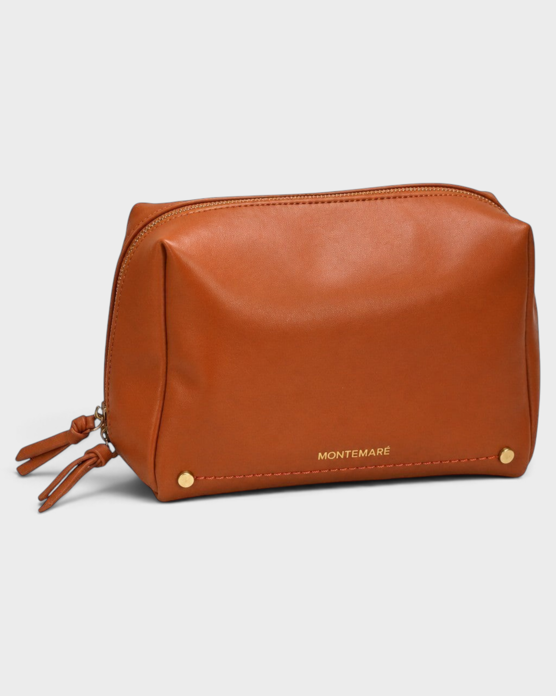 Montemaré Roma standing toiletry case in tan vegan leather with gold hardware and double zipper pulls