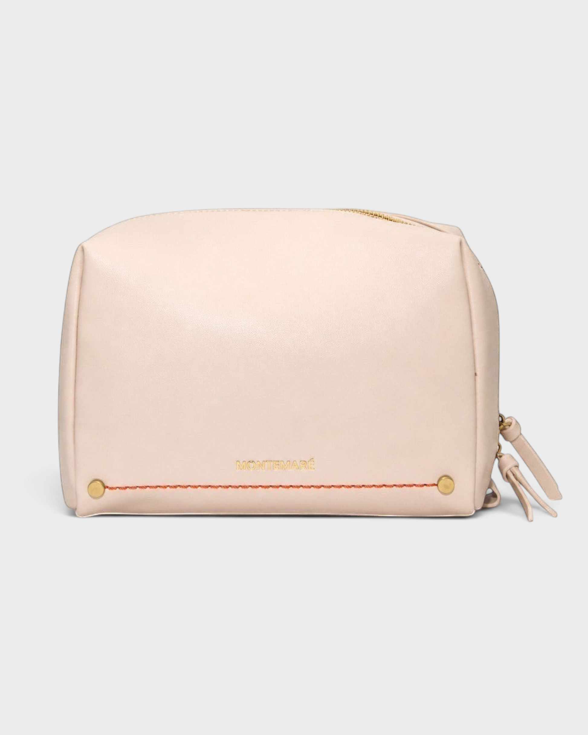 Montemaré Roma standing toiletry case in blush vegan leather with gold hardware and orange accent stitching