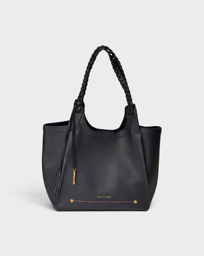 Montemaré Sedona black vegan leather tote bag with hand-braided straps and signature safety whistle tassel.
