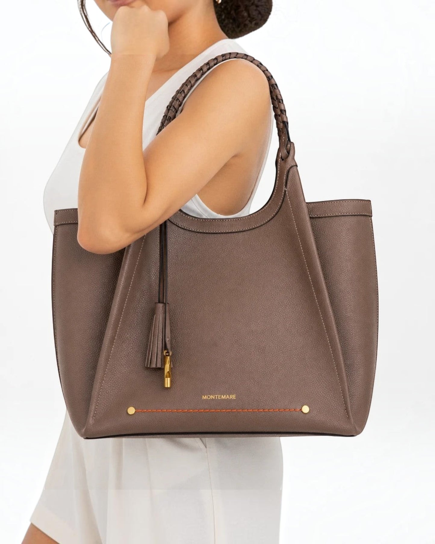 Montemaré Sedona Work Tote in brown pebbled vegan leather with hand-braided handles and signature whistle tassel.