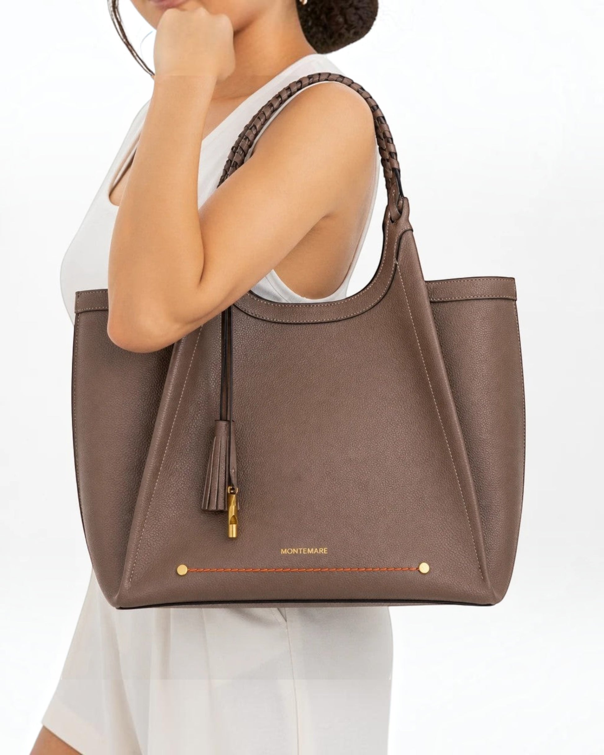 Montemaré Sedona Work Tote in brown pebbled vegan leather with hand-braided handles and signature whistle tassel.