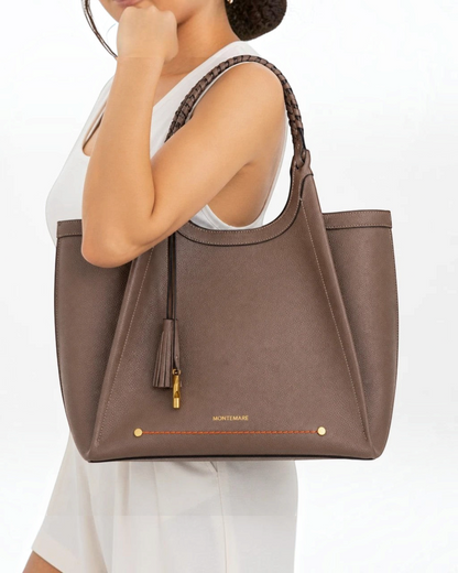 Montemaré Sedona work tote in brown vegan leather with hand-braided handles and signature whistle tassel on shoulder