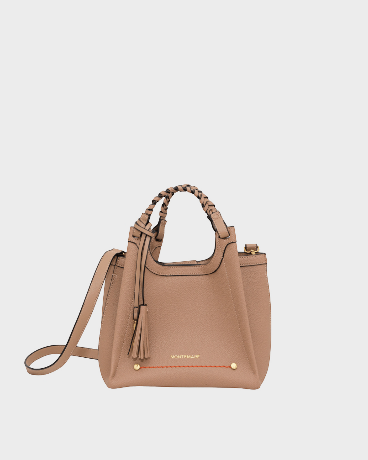 Montemaré Sedona Crossbody bag in beige pebbled vegan leather with a braided handle and signature whistle tassel.