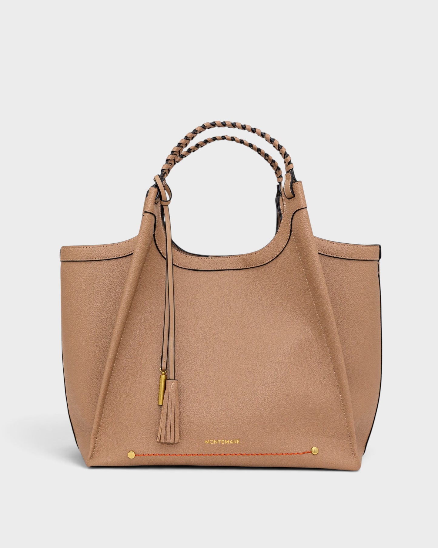 Montemaré Sedona work tote in tan pebbled vegan leather with hand-braided handles and signature whistle tassel.