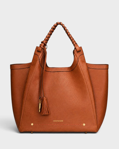 Montemaré Sedona work tote in tan pebbled vegan leather with hand-braided handles and signature whistle tassel