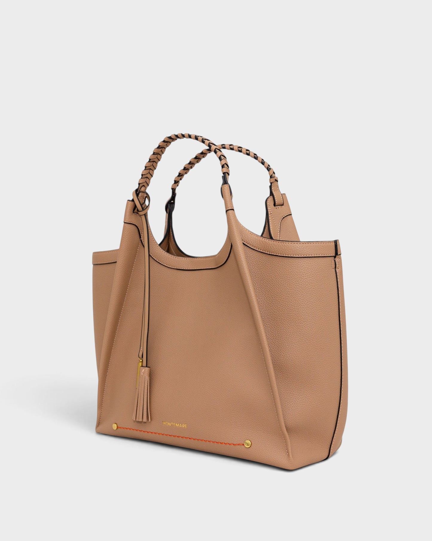 Montemaré Sedona work tote in tan pebbled vegan leather with hand-braided handles and signature whistle tassel.