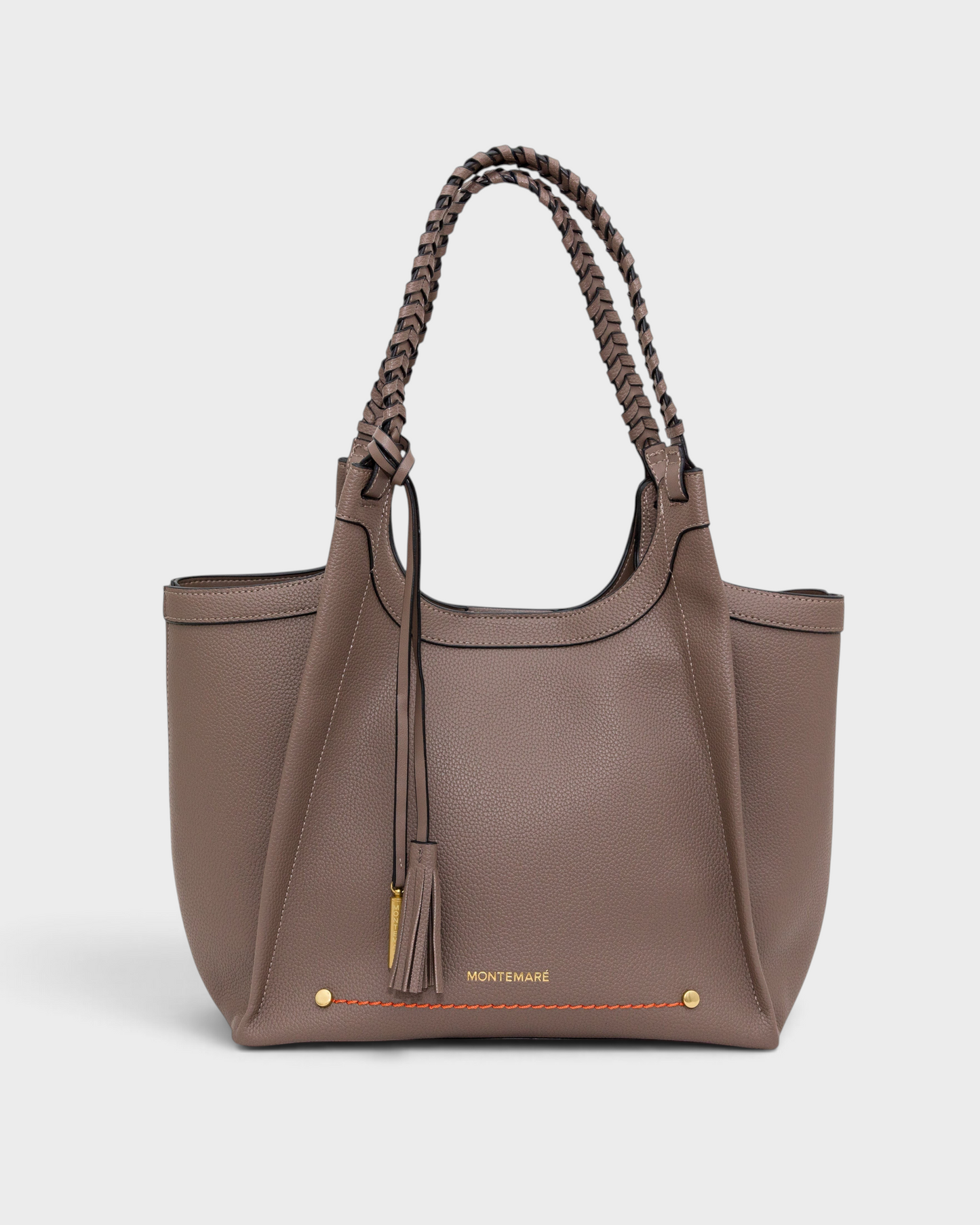 Montemaré Sedona tote bag in taupe vegan leather with hand-braided shoulder straps and a signature whistle tassel.
