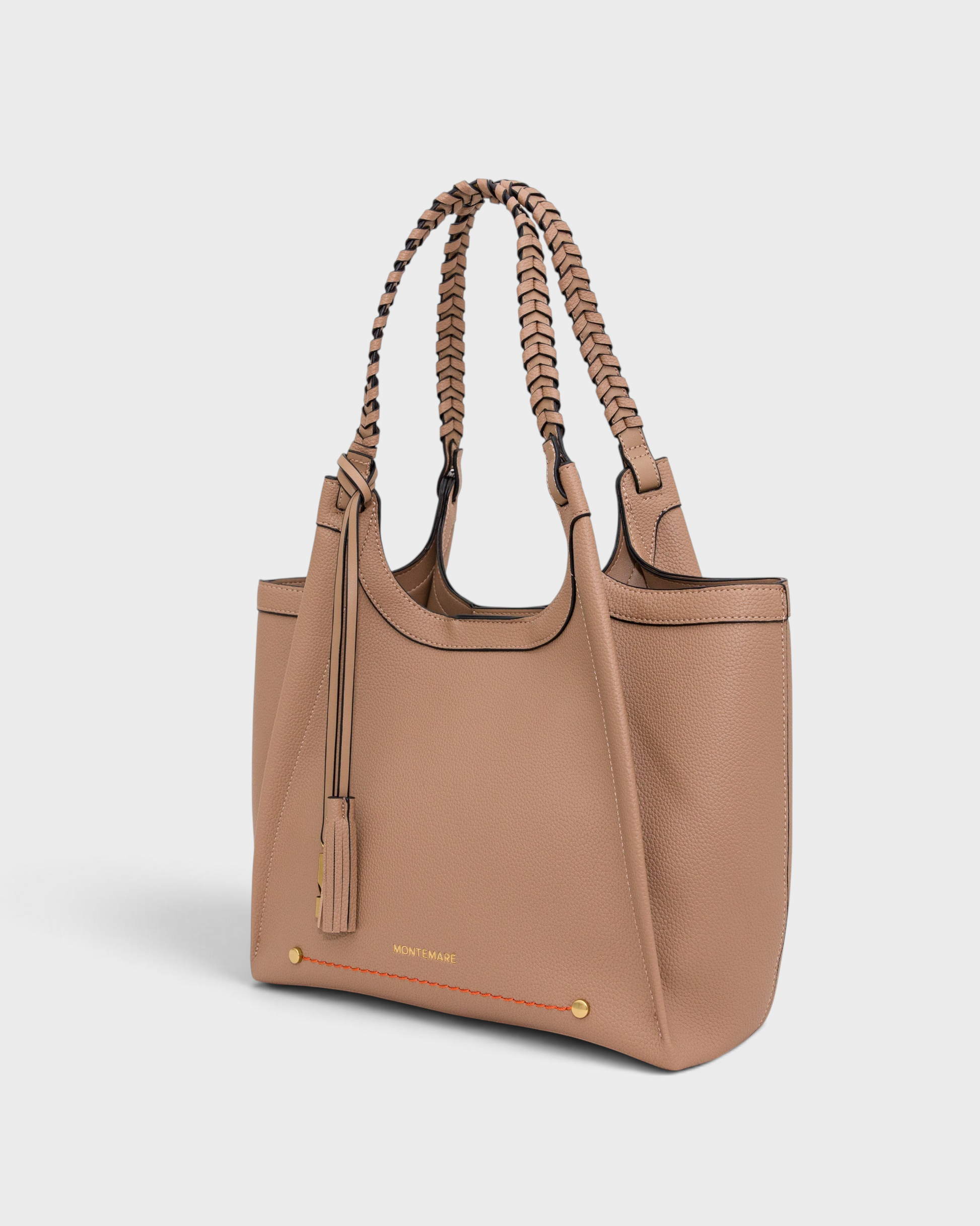 Montemaré Sedona vegan leather tote bag in beige with hand-braided straps and signature whistle tassel