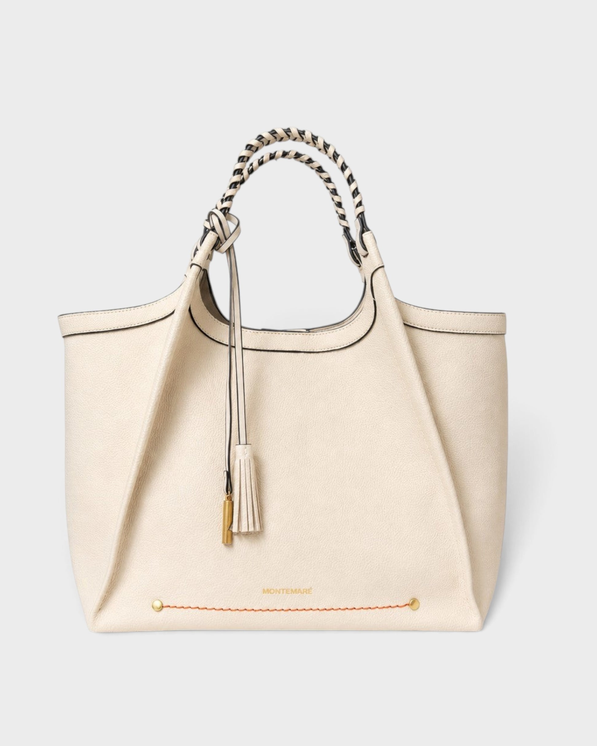 Montemaré Sedona Work Tote in cream pebbled vegan leather with hand-braided handles and signature whistle tassel.