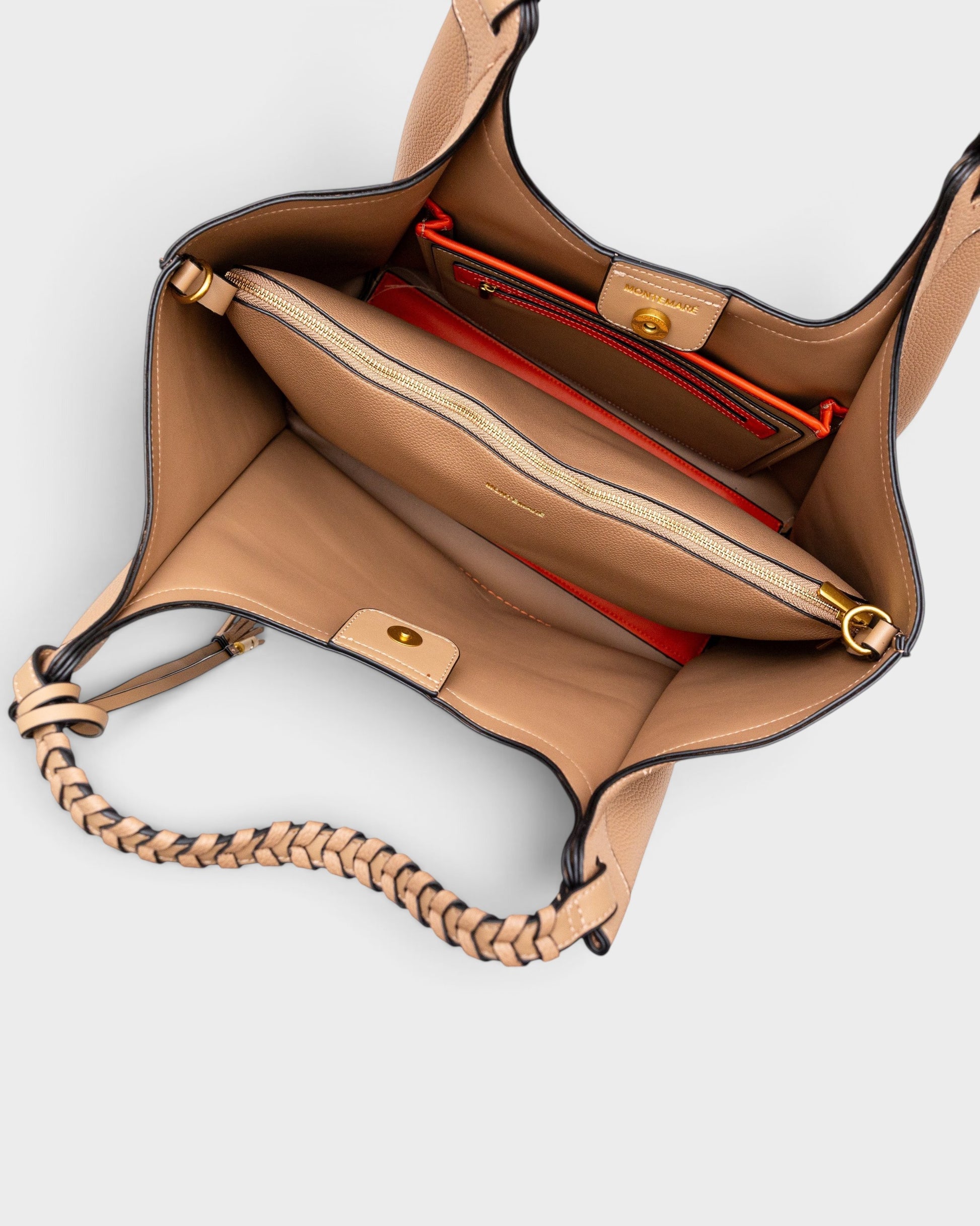 Interior view of Montemaré Sedona Work Tote in tan vegan leather with orange accents, removable laptop sleeve, and pockets.