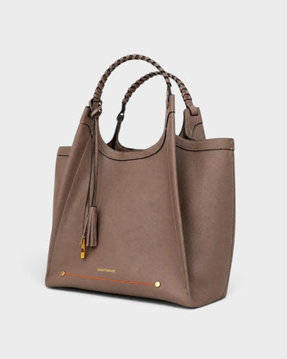 Montemaré Sedona Work Tote in taupe pebbled vegan leather with hand-braided handles and signature whistle tassel.