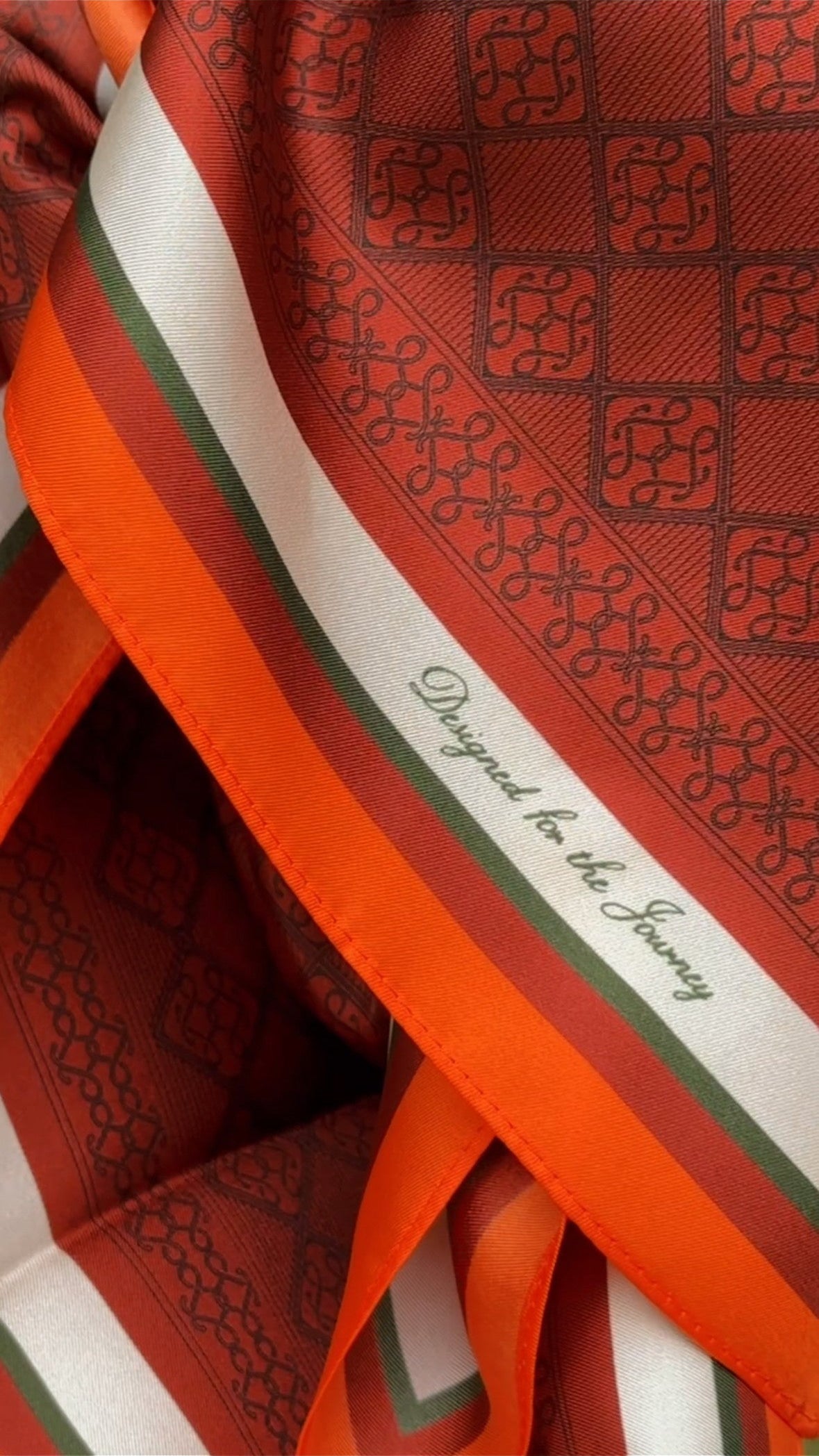 Montemaré Original silk square scarf featuring a geometric pattern in rust orange with white and green striped borders