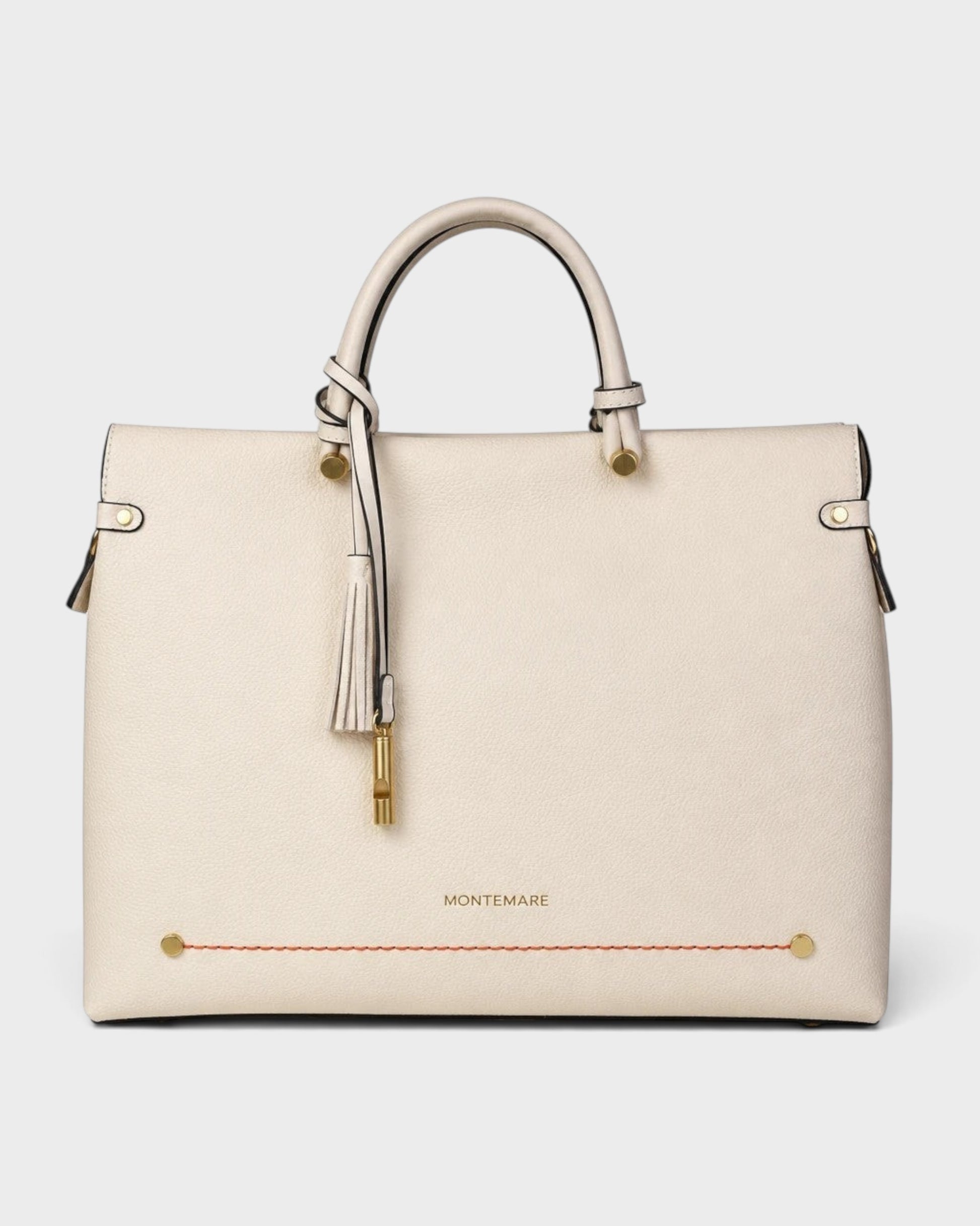 Montemaré Vienna small carry-on tote in cream vegan leather with a safety whistle tassel and gold hardware