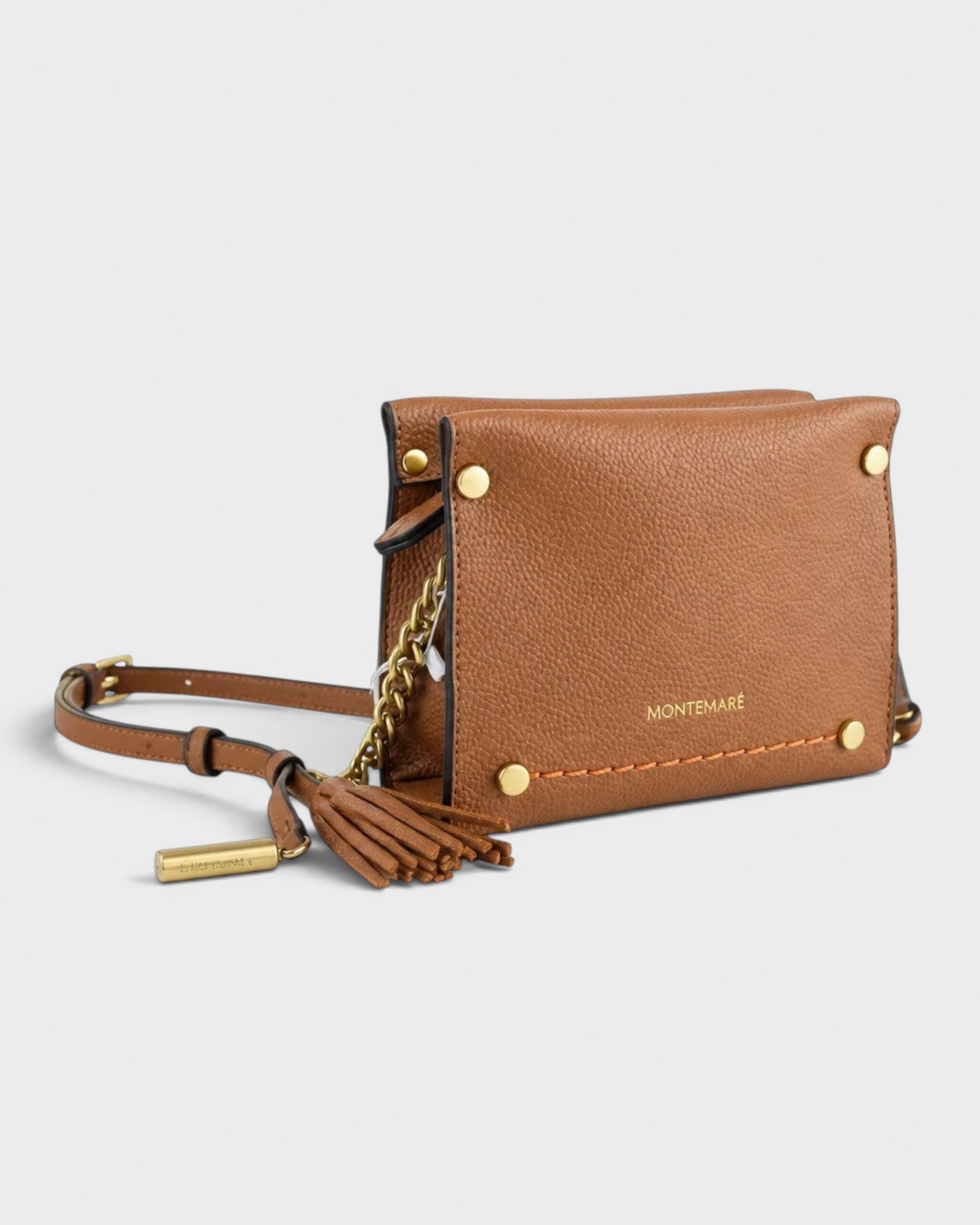 Montemaré Vienna Mini Crossbody in brown pebbled vegan leather with gold chain, whistle tassel, and adjustable strap.