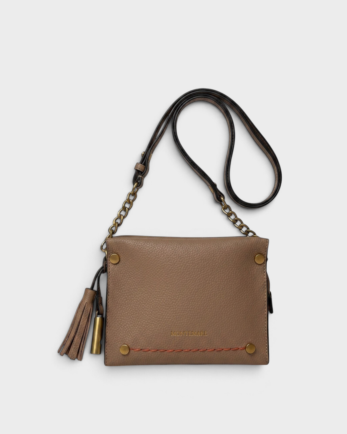 Montemaré Vienna Mini Crossbody in taupe pebbled vegan leather with a gold chain strap and signature whistle tassel.