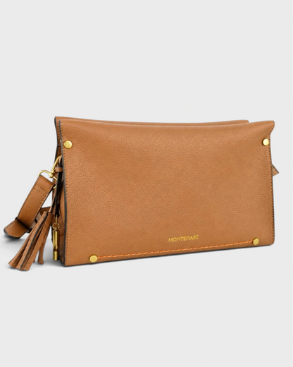 Montemaré Vienna small shoulder bag in tan pebbled vegan leather with gold hardware and a signature whistle tassel.